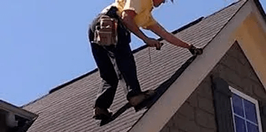 A man working on the roof